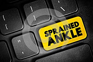 Sprained Ankle is an injury that occurs when you roll, twist or turn your ankle in an awkward way, text button on keyboard,