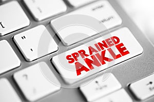 Sprained Ankle is an injury that occurs when you roll, twist or turn your ankle in an awkward way, text concept button on keyboard