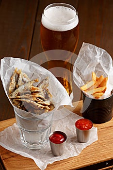 Sprat and french fries with gravy