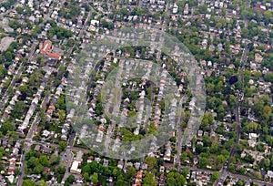 Sprawling suburban landscape full of houses and apartment buildings photo