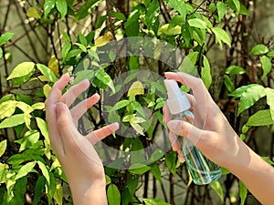 Spray alcohol on hand for personal safety and to prevent germs, disease , viruses.