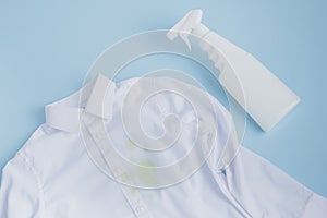 Spray bleach plastic bottle bleach for white clothes. Cleaning concept. isolated on blue background. top view