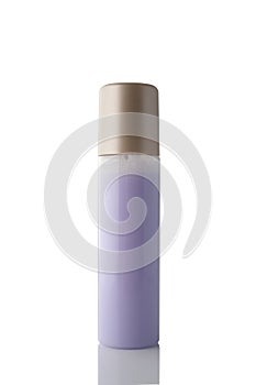 Spray bottle with colored liquid isolated on white background