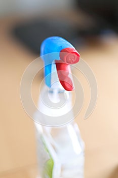 Spray bottle of disinfectant household cleaners.