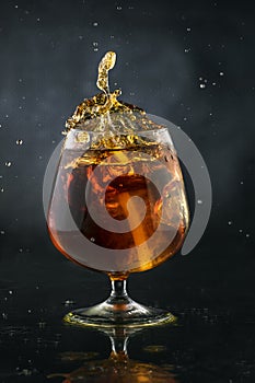 Spray in cognac glasss