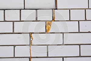 Spray Foam Insulation. Insulate wall cracks with foam caulking gun. photo