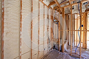 Spray Foam insulation in new home construction photo