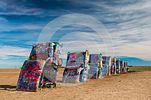 Spray painted cars in the desert