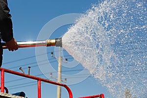 Spray water during fire training in the industry