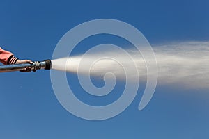 Spray water on truck during fire training