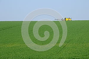 Sprayer in field in Val d Oise photo