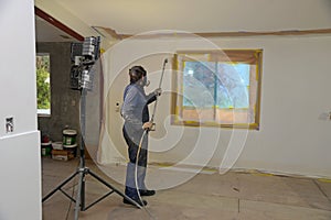 Spraying inside a commercial room
