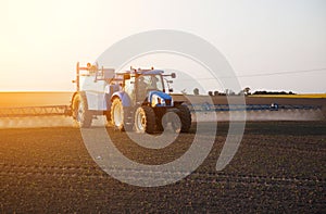 Spraying machine working on the green field