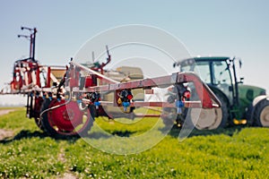 View of Tractor Ready to Spraying Herbicides. photo