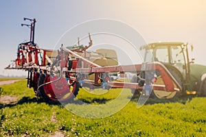 View of Tractor Ready to Spraying Herbicides. photo