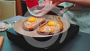 Spread the egg yolk on top of the fried toast