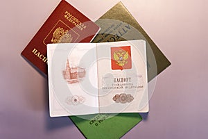 The spread of the first pages of the passport of the Russian Federation against the background