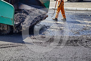 Spread hot asphalt