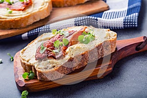 Spreads. Egg spread, grilled bacon, bread young basil leaves