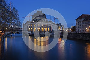 Spree River and Bode Museum in Berlin at dusk photo