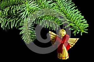 Sprig of spruce with handmade angel