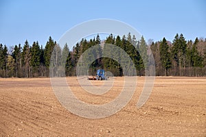 Spring agricultural work in Lithuanian countryside