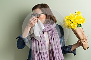 Spring allergy to pollen. Woman with bouquet