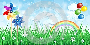 Spring background with pinwheels and rainbow