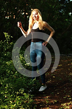 Spring beauty girl. Beautiful young woman in a summer park outdo