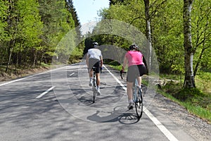 Spring bike riding through tree avenue