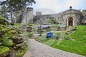 Springtime at Bishop Brute Seminary Castle with Manicured Gardens photo