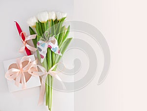 Spring bouquet greeting card. White tulip and gift box pink ribbon.Wedding invitation template.8 March Happy Mothers Day