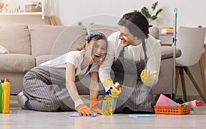 Spring-Clean. Young Couple Having Fun While Cleaning House, Washing Floor Together