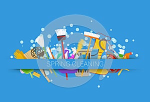 Spring cleaning supplies blue background. tools of housecleaning