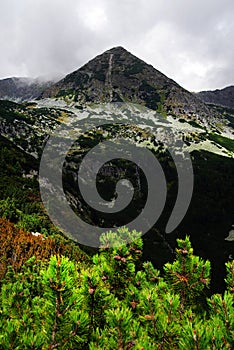 Spring cloudy landscape in Retezat Mountains