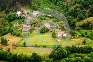 Spring is coming... Amazing spring view with a little village in Rhodopi Mountains, Bulgaria. photo