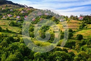 Spring is coming... Amazing spring view with a little village in Rhodopi Mountains, Bulgaria. photo