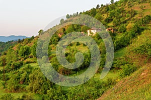 Spring is coming... Amazing spring view with a little village in Rhodopi Mountains, Bulgaria. photo