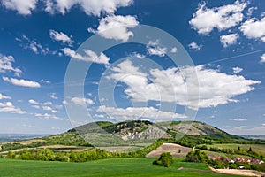 Spring countryside with blue sky and clouds