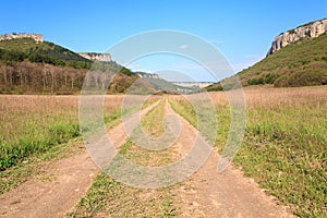 Spring Crimean mountain landscape with road