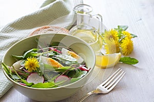 Spring dandelion salad with egg and radish