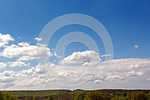 Spring day white clouds in the blue sky. Mountains of Slovakia - spring landscape. The concept of ecology.