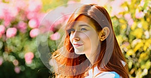 Spring design with beautiful woman face for banner or website header, copy space. Close up portrait of a beautiful red