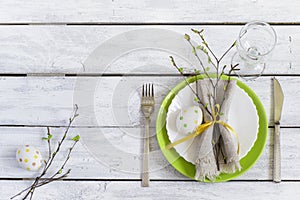 Spring Easter Table setting at wooden table. Top view.