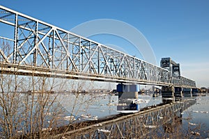 Spring evening in Arkhangelsk. Ice drift on the Severnaya Dvina river. The world`s northernmost drawbridge