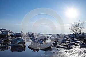 Spring evening in Arkhangelsk. Ice drift on the Severnaya Dvina river. The world`s northernmost drawbridge