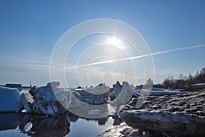 Spring evening in Arkhangelsk. Ice drift on the Severnaya Dvina river. The world`s northernmost drawbridge