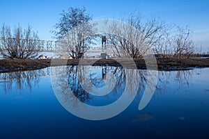 Spring evening in Arkhangelsk. Ice drift on the Severnaya Dvina river. The world`s northernmost drawbridge