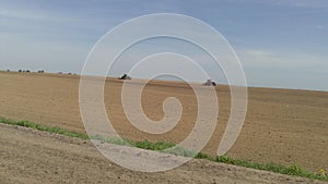 Spring field work on tractors.