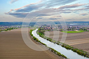 Spring fields with river - drone view